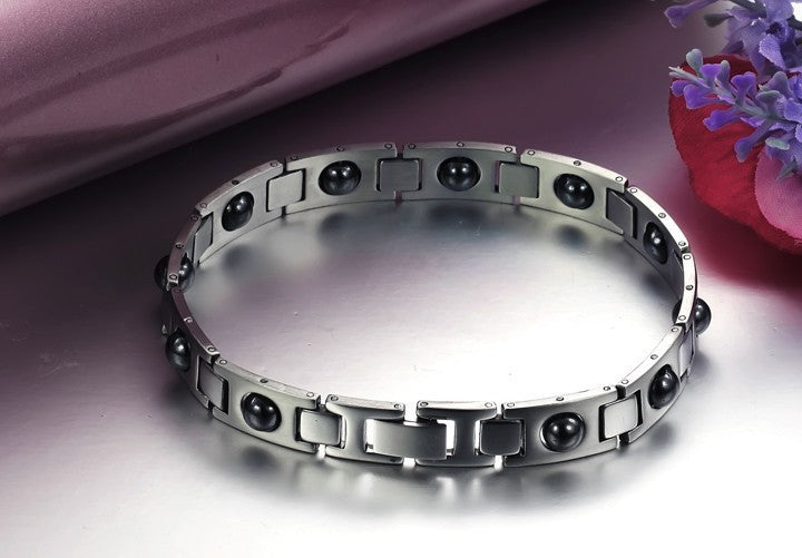 Bracelet énergétique magnétique en acier titane et calculs biliaires noirs - LUXARAH