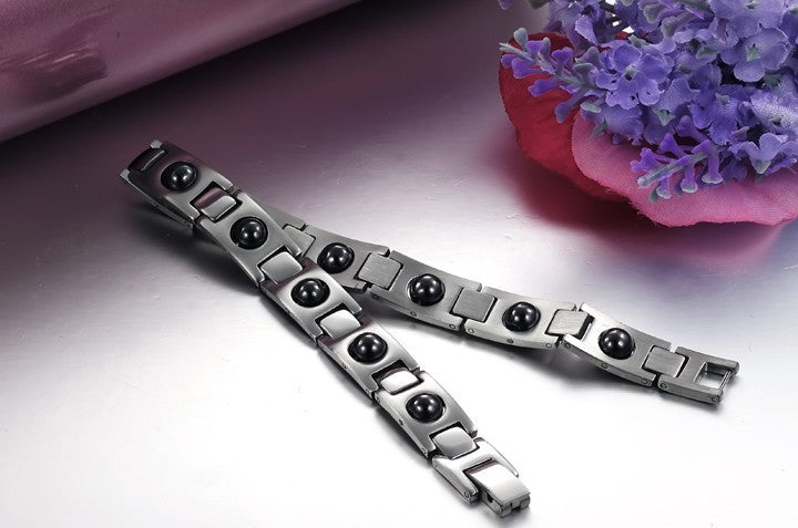 Bracelet énergétique magnétique en acier titane et calculs biliaires noirs - LUXARAH