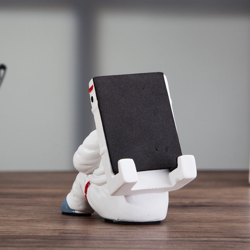 Support de téléphone portable simple et créatif pour étudiant, accessoire de bureau mignon et astronaute, idéal comme cadeau ou décoration de bureau