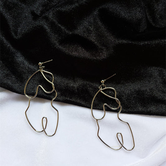 Boucles d'oreilles Twistées Oversize – Élégance audacieuse pour briller en toute confiance - LUXARAH