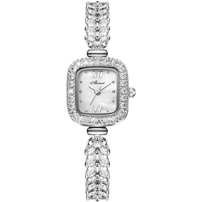 Montre à quartz tempérament et entièrement sertie de pierres précieuses, petite pointe dorée, petite plaque carrée - LUXARAH