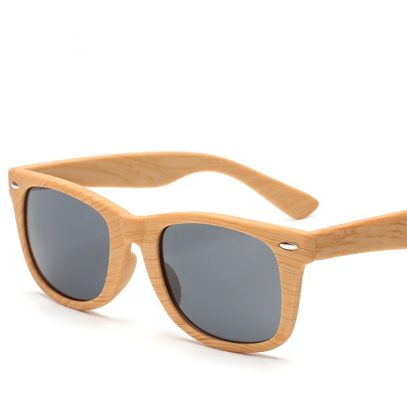 Lunettes de soleil rétro en plastique grain de bois avec clous de riz