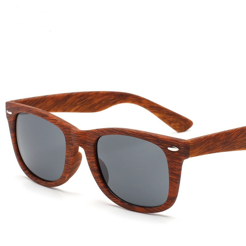 Lunettes de soleil rétro en plastique grain de bois avec clous de riz