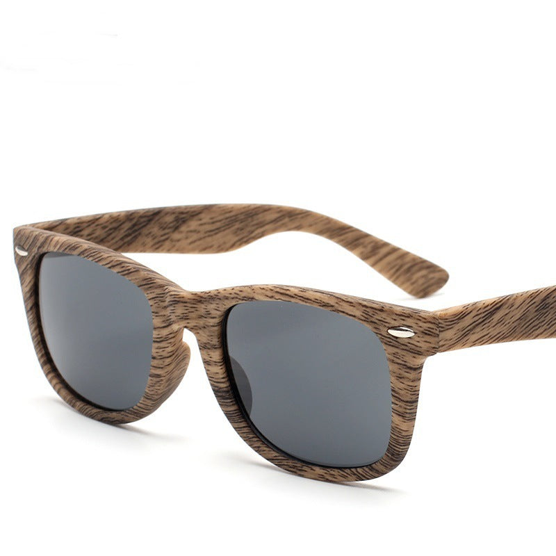 Lunettes de soleil rétro en plastique grain de bois avec clous de riz