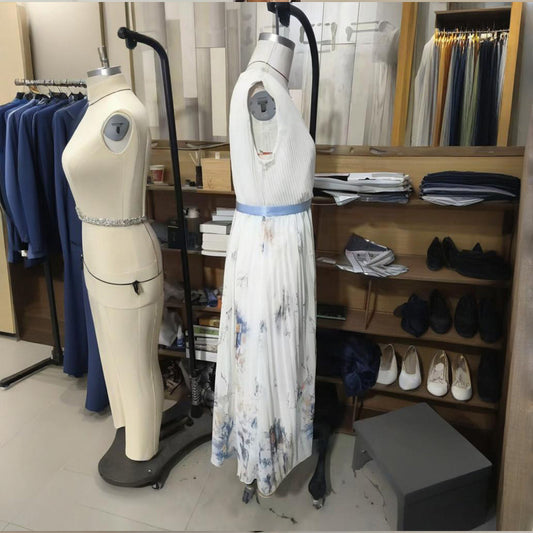 Robe longue sans manches à imprimé floral et col en V profond avec poches - Robe de plage fluide à ourlet volanté - LUXARAH