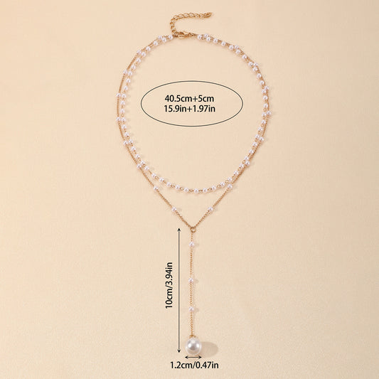 Collier double couche de perles jumelles