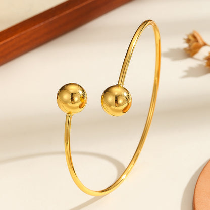 Bracelet ouvert à double perle en or 18 carats plaqué cuivre, au tempérament simple pour femme, idéal pour les cadeaux et le quotidien.
