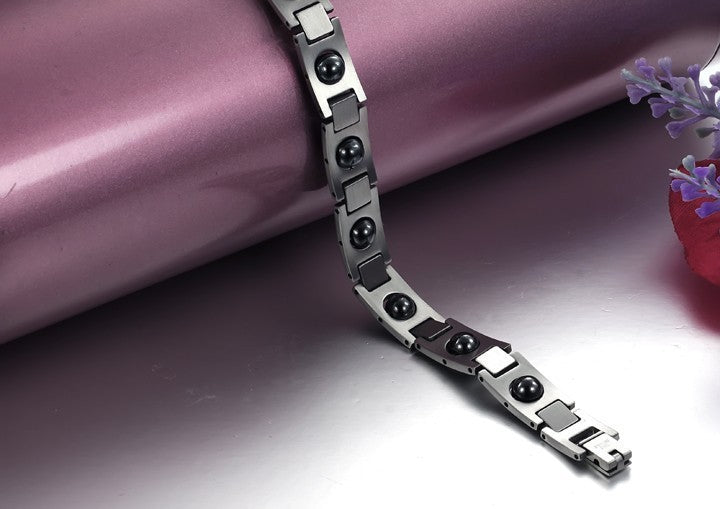 Bracelet énergétique magnétique en acier titane et calculs biliaires noirs - LUXARAH