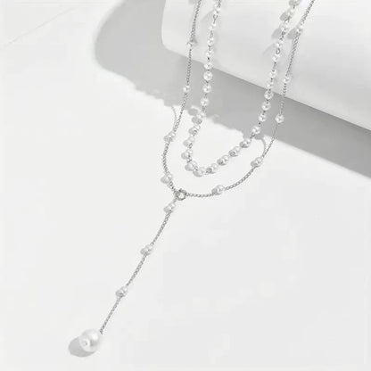 Collier double couche de perles jumelles