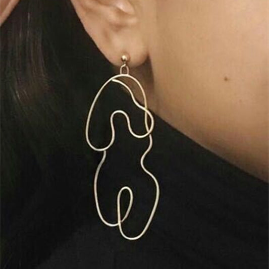 Boucles d'oreilles torsadées exagérées