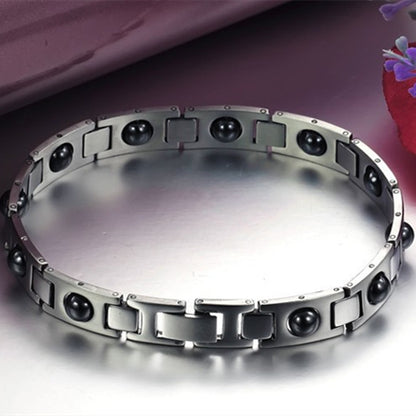 Bracelet énergétique magnétique en acier titane et calculs biliaires noirs - LUXARAH