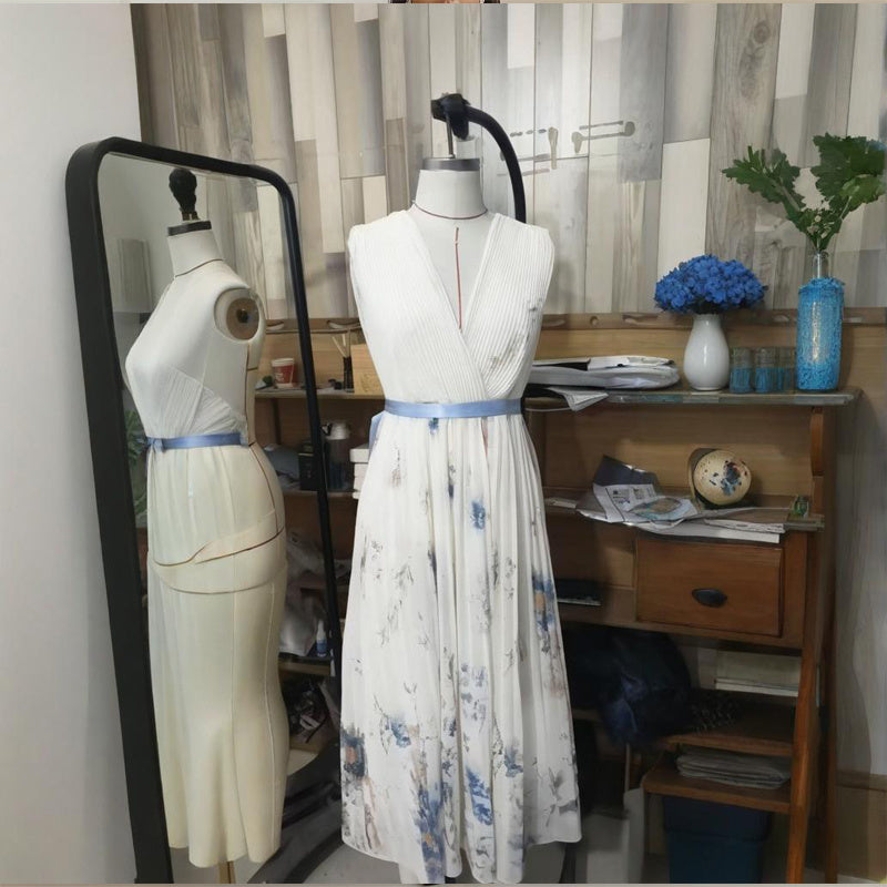 Robe longue sans manches à imprimé floral et col en V profond avec poches - Robe de plage fluide à ourlet volanté - LUXARAH
