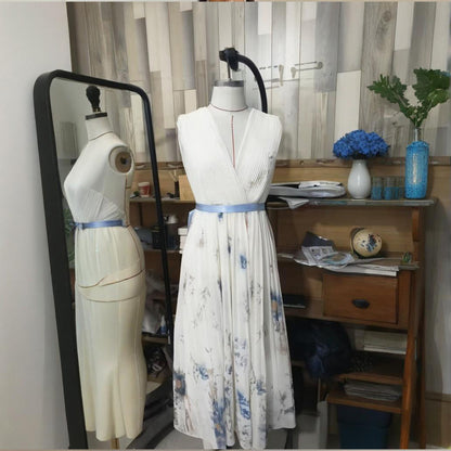 Robe longue sans manches à imprimé floral et col en V profond avec poches - Robe de plage fluide à ourlet volanté - LUXARAH